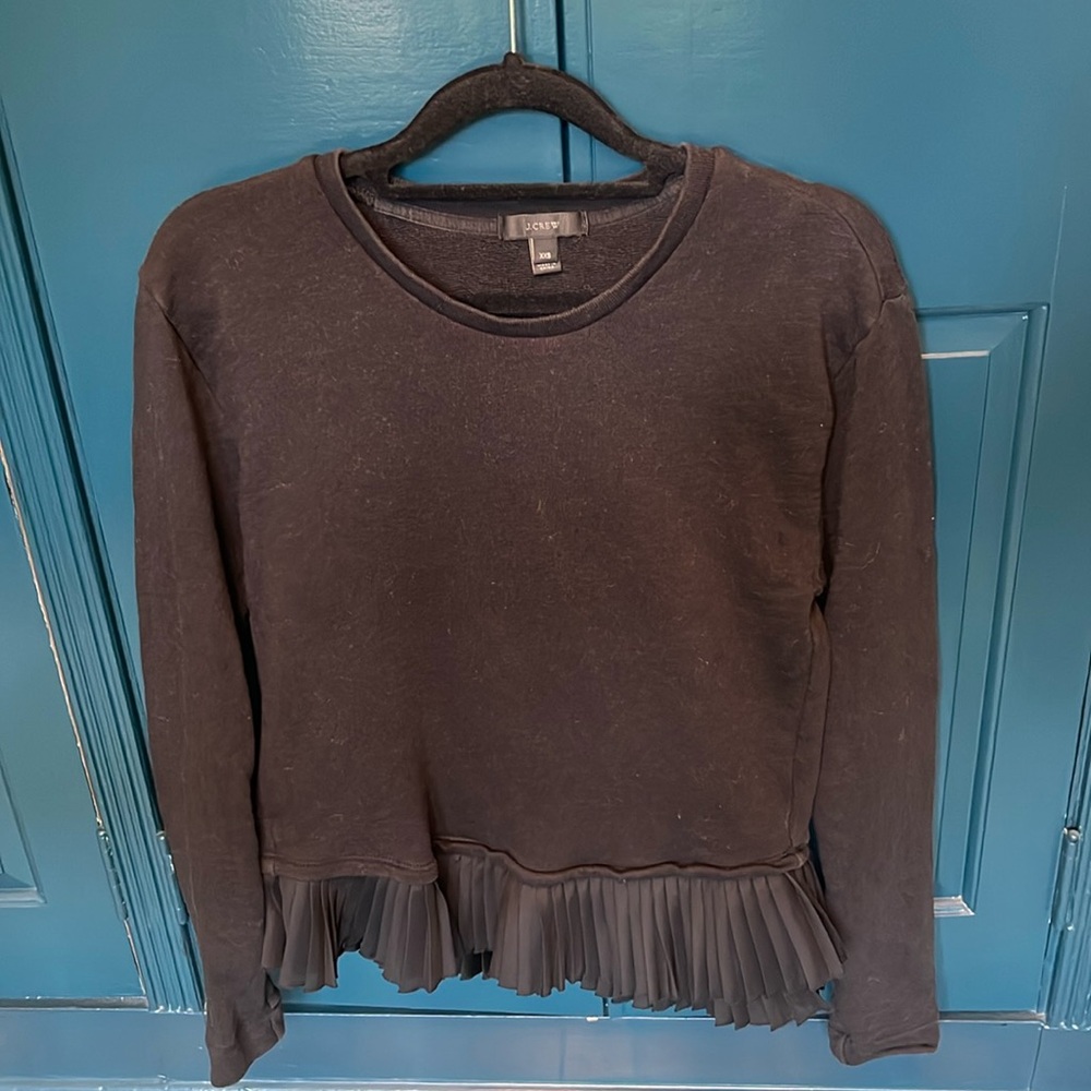 JCrew black sweatshirt with silk ruffle hem